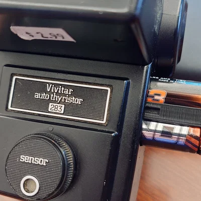 Khay gắn pin AA cho đèn flash Vivitar 283