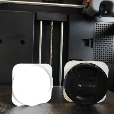 Kẹp giữ nắp ống kính máy ảnh (Lens Cap Clip) gắn dây đeo balo tiện lợi