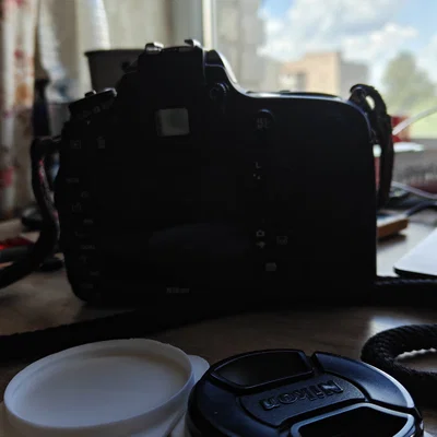 Kẹp giữ nắp ống kính máy ảnh (Lens Cap Clip) gắn dây đeo balo tiện lợi