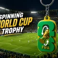 Móc khóa cúp World Cup 2026 xoay độc đáo cho tín đồ bóng đá - Thumbnail 1
