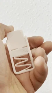 Đồ chơi nút bấm lò xo (A spring button fidget) - Image 1