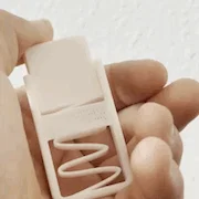 Đồ chơi nút bấm lò xo (A spring button fidget)
