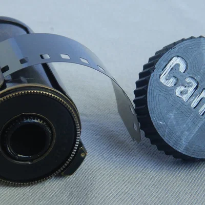 Núm vặn cuộn phim cho ống phim nạp lại Canon