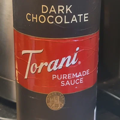 Đế giữ chai sốt Torani