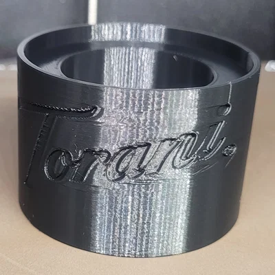 Đế giữ chai sốt Torani