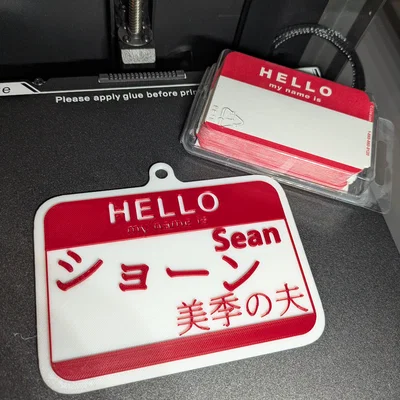 Thẻ tên "Hello My Name is" kèm lỗ xỏ dây