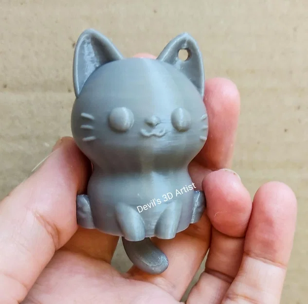 Móc khóa mèo 3D đáng yêu có đuôi cử động linh hoạt - Image 1