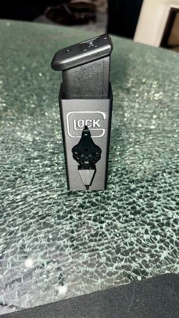 Giá đỡ băng đạn Glock 17/34/45/47 kèm dụng cụ chỉnh Osight - Image 1