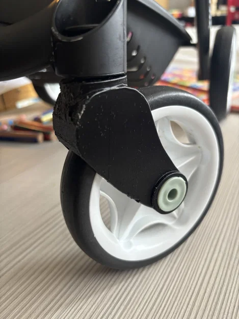 Cụm bánh xe cho xe đẩy đồ chơi Maxi Cosi - Image 1