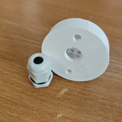 Đế gắn cảm biến đa năng kèm tấm lưới tản nhiệt và lỗ cáp PG-7