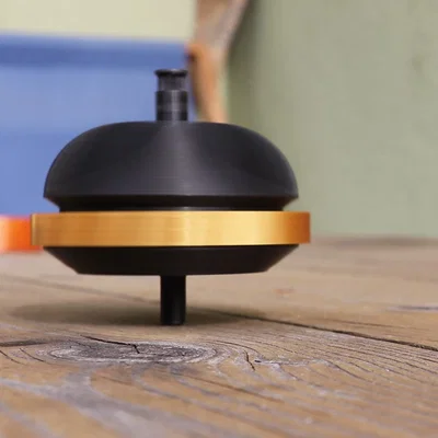 Con quay hai tầng (Two-Stage Spinning Top)