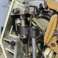 Tay đòn điều khiển Zigzag (Bight Actuator) cho máy may Singer Futura Series - Thumbnail 1