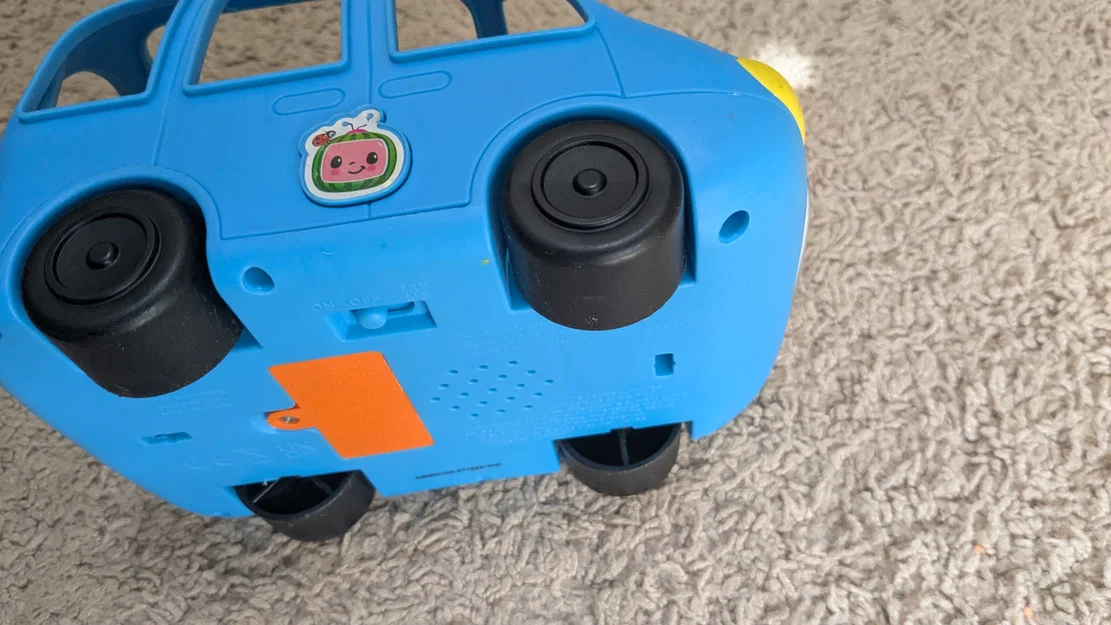 Nắp đậy khay pin cho xe đồ chơi CoComelon Family Fun Car - Image 1
