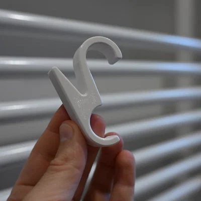 Móc treo/Giá đỡ gắn vào máy sưởi phòng tắm