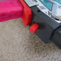 Nút tháo băng đạn mở rộng (Extended Mag Release) cho X-Shot Longshot - Thumbnail 2