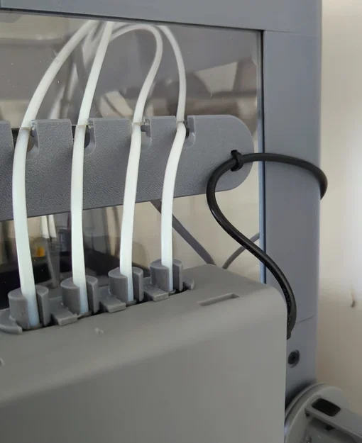 Nắp che lỗ ống PTFE có tích hợp kẹp giữ dây cáp dữ liệu cho máy in 3D - Image 1