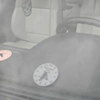 Đĩa báo giờ đỗ xe (Parking Disc/Parkimiskell)
