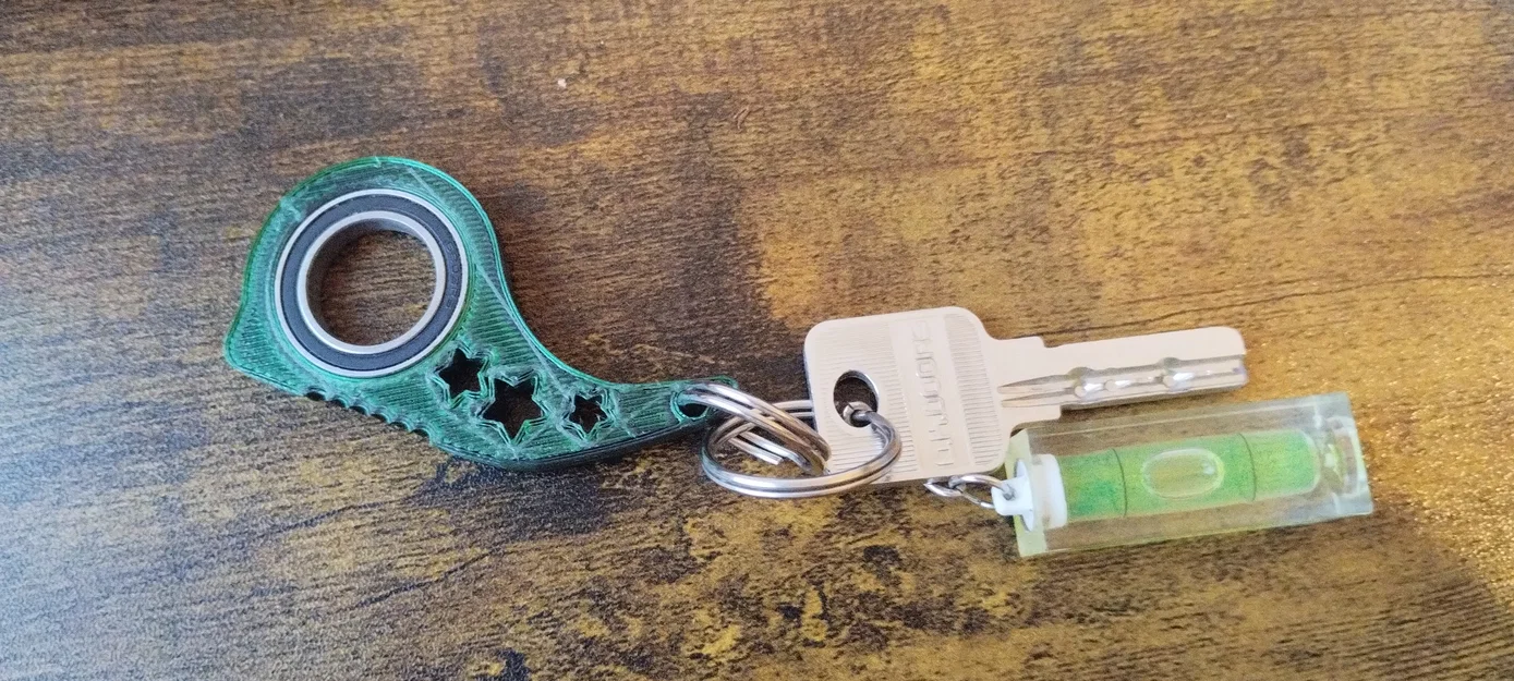 Móc khóa Keyrambit Star xoay 3D tiện lợi cho chìa khóa - Image 3