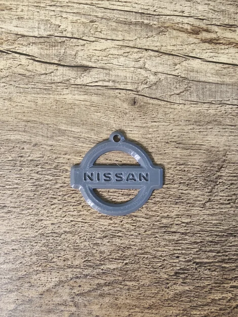 Móc khóa logo Nissan - Image 1