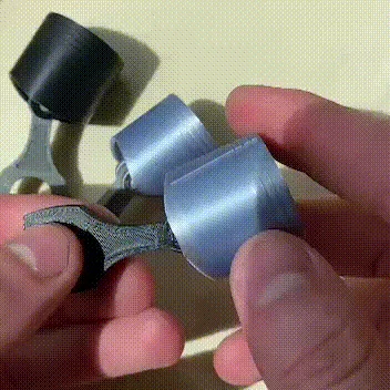 Móc khóa Piston Clicker
