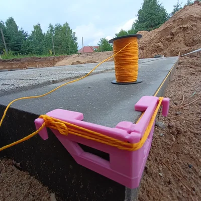 Dụng cụ căng dây cho thợ xây (Mason’s Line Tensioner)