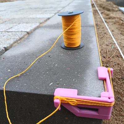 Dụng cụ căng dây cho thợ xây (Mason’s Line Tensioner)