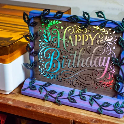 Bảng đèn LED "Happy Birthday" kèm khung trang trí họa tiết dây leo