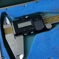 Nắp đậy pin cho thước cặp điện tử Mitutoyo 500-322 - Thumbnail 1