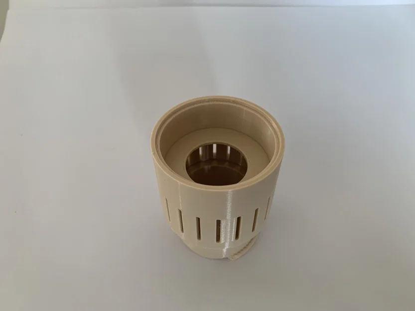 Hộp chứa hạt hút ẩm silicate đặt giữa lõi cuộn filament - Image 1