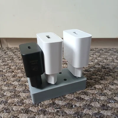 Đế giữ củ sạc 3D tiện lợi cho bàn làm việc gọn gàng