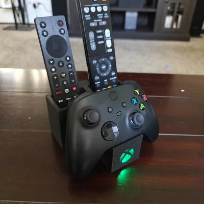 Giá đỡ tay cầm Xbox kèm khe để điều khiển TV, dàn âm thanh và logo đèn nền