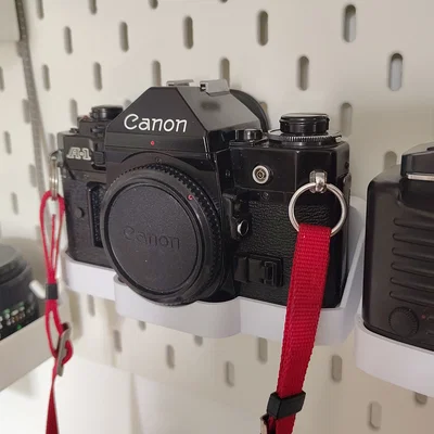 Kệ treo máy ảnh Canon A1 cho bảng Skadis