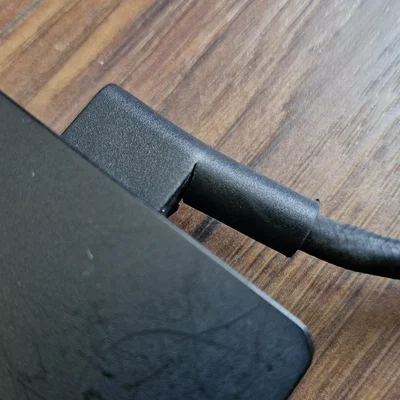 Miếng kẹp cố định dây nguồn cho sạc laptop Razer Blade