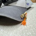 Tee holder: Phụ kiện gắn cọc golf tiện ích trên vành mũ - Thumbnail 2