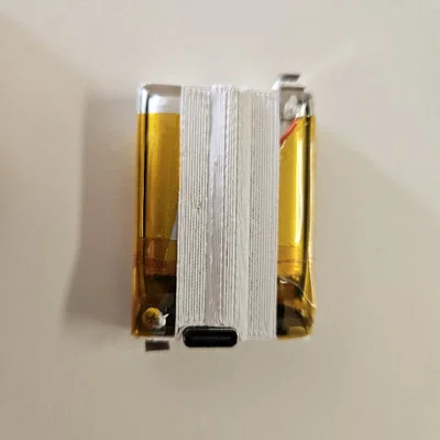 Khung pin cho đèn đeo đầu Petzl Core
