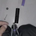 Phụ kiện in 3D hỗ trợ mài sạch pin 18650 cho máy Dremel 300 - Thumbnail 3