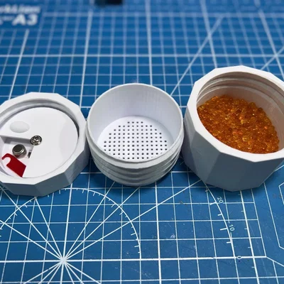 Hộp đựng máy trợ thính có ngăn chứa đồ và hạt hút ẩm
